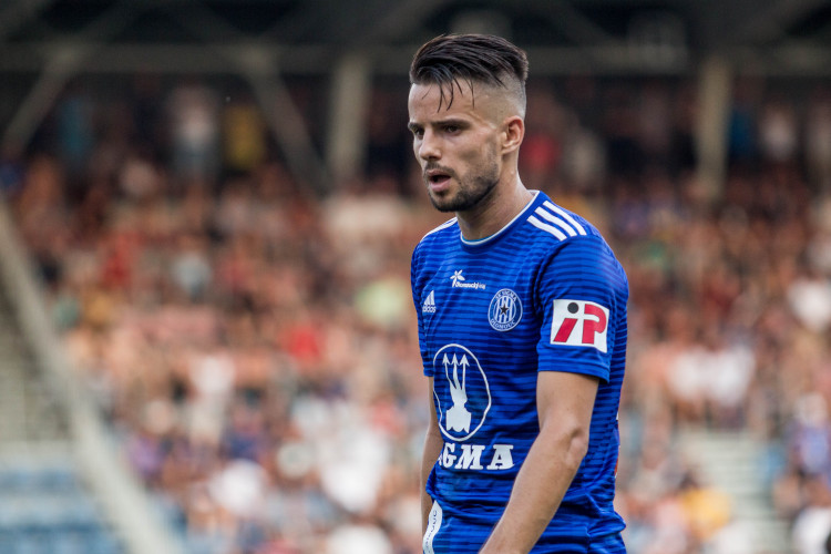 FOTOGALERIE: Sigma padla s Baníkem na hřišti i na tribunách. Tady jsou fotky